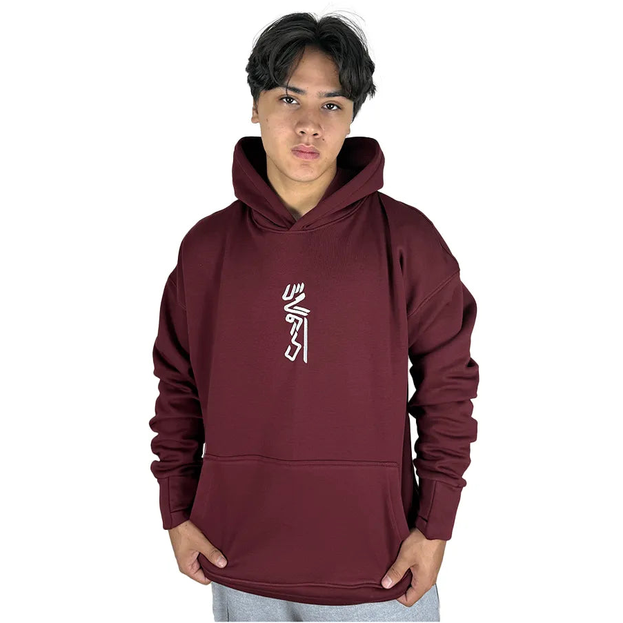Person wearing a maroon hoodie with a logo on a white background